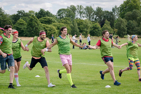 men playing sports game during their sports day event