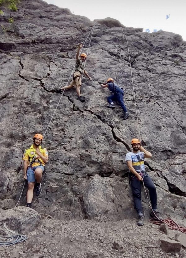 Youth group enjoying rock climbing in Wales.